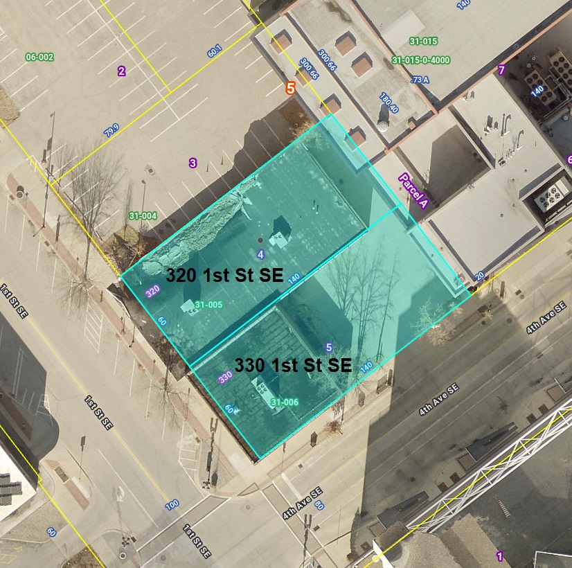 Aerial photo of downtown Cedar Rapids land with addresses of the two parcels overlayed on site