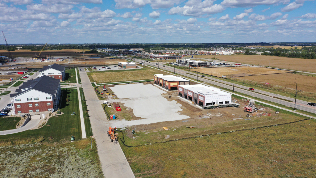 Aerial image of retailers east of Highway 965
