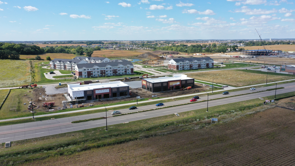 Aerial of Redhawk Street buildings and 965 Flats apartments