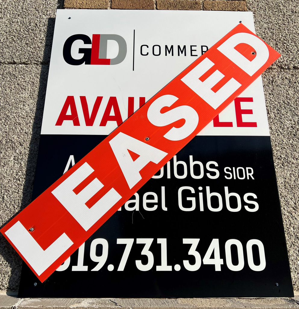 GLD Commercial sign with a LEASED rider