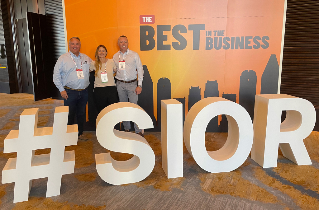 Dave Drown, Angie Glick-Martin and Adam Gibbs at the SIOR conference