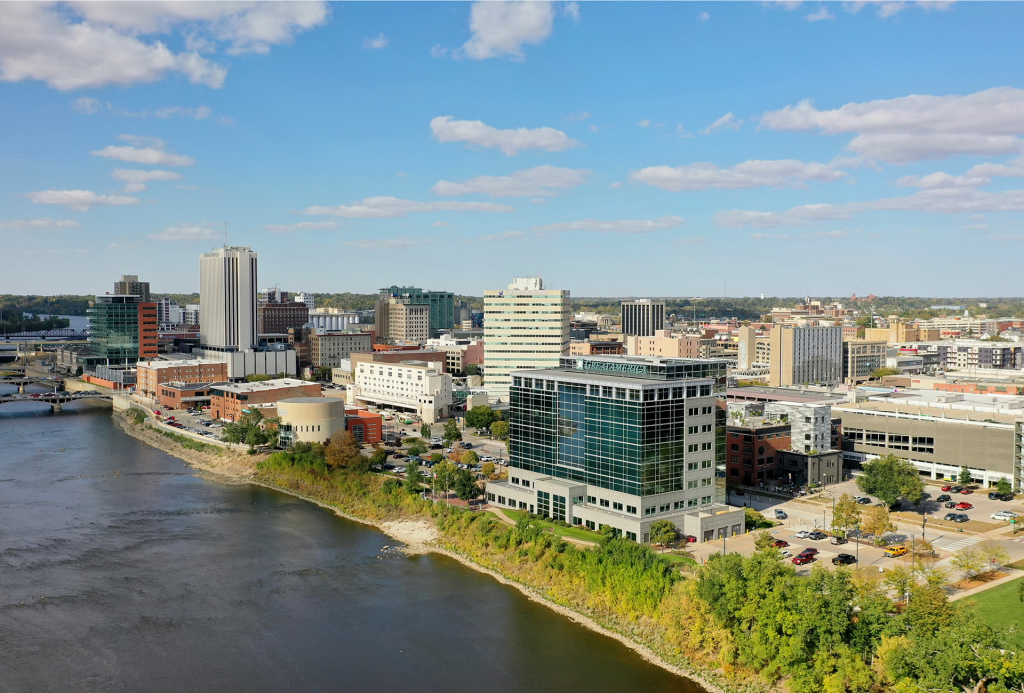 Drone photo of downtown Cedar Rapids showing river and multiple commercial buildings